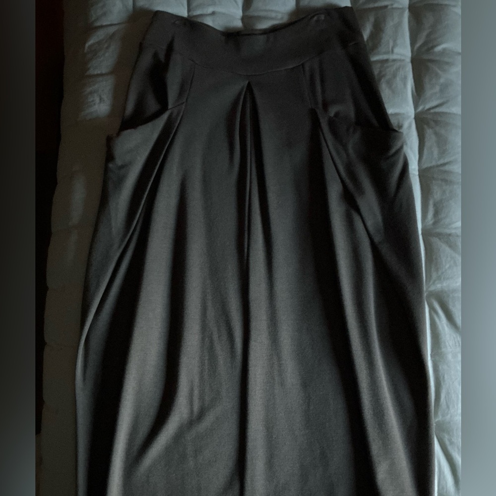 Stylish dark Brown Maxi Skirt. Wide elastic waist. Front pockets and pleats.